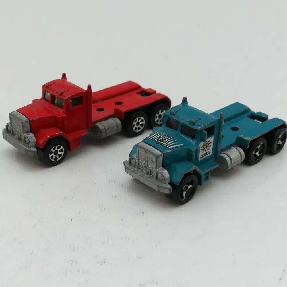 Lot of 2 Hot Wheels Red Blue Semi Truck Tractor Cab Diecast Heavy Hauler Toys